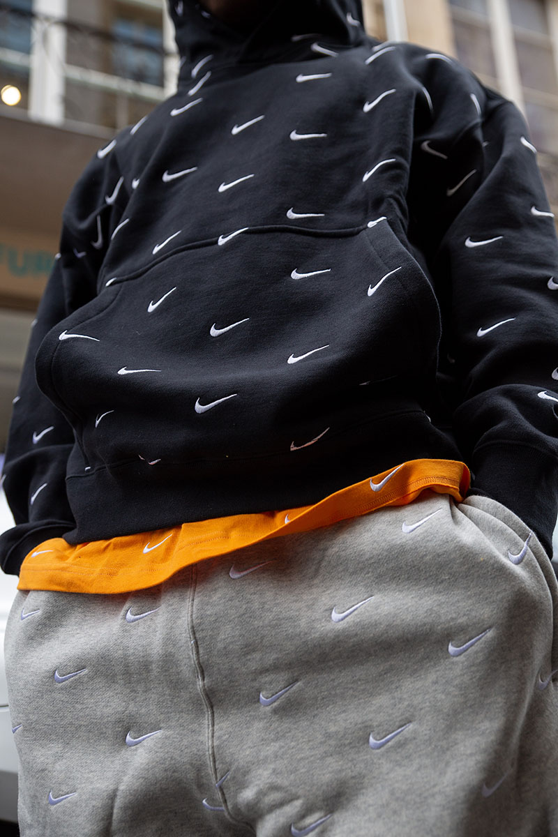 nike sweatpants with checks all over
